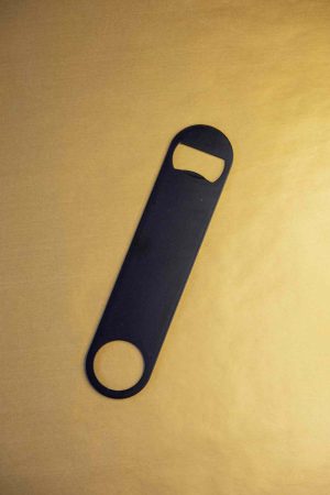 Premium black flat bottle opener - sleek design for effortless opening. Ideal for home or bartending use. Buy online now!