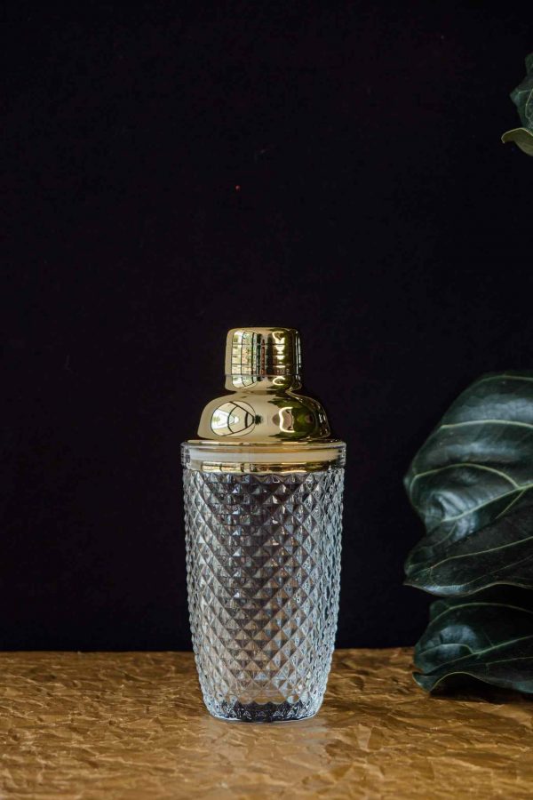 Add a touch of elegance to your bar with 'Gold' glass shaker - the perfect blend of style and functionality for cocktail enthusiasts!