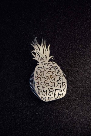 Silver pineapple strainer - Elegant kitchen accessory for effortless juicing and cocktail making, crafted for exquisite taste experiences.