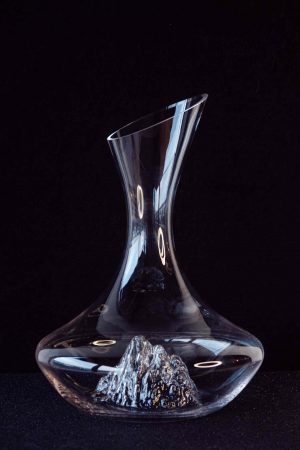 Enhance your wine experience with the elegant Iceberg wine decanter - a stylish addition to your collection. Perfect for aerating and serving your favorite wines.