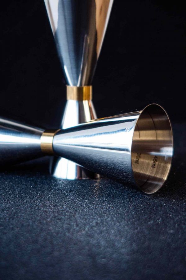 30/60 silver vase with elegantly designed gold strip, perfect for adding a touch of luxury to any space. Ideal for home decor.