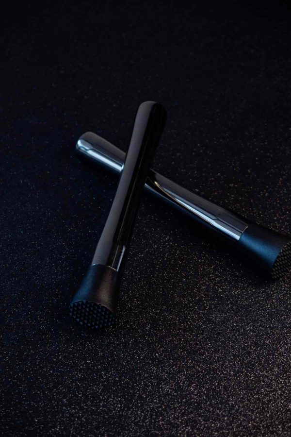 Enhance your cocktail game with the sleek Glossy Black Muddler - the ultimate bartender essential for perfectly mixed drinks!
