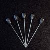 Premium black caveira cocktail sticks for elegant drink presentations, ideal for parties and events, stylish bar accessories.