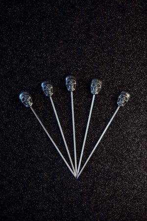 Premium black caveira cocktail sticks for stylish drinks presentation and serving - perfect for entertaining guests and elevating your cocktails!