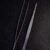 Premium precision tweezers for intricate decorating, essential tool for crafting and grooming tasks