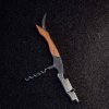 Premium waiter's corkscrew featuring a sleek wooden handle for easy uncorking - ideal for wine enthusiasts and professionals alike
