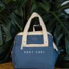 Stay cool on the go with our dark blue insulated cooler bag - perfect for picnics and outdoor adventures. Get yours today!