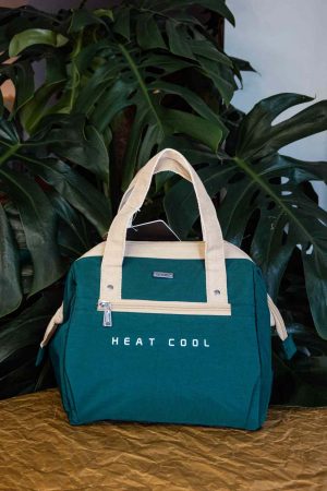 Stay cool on the go with our Green Insulated Cooler Bag - perfect for picnics, beach trips, and outdoor adventures. Keep your drinks and snacks fresh all day long!